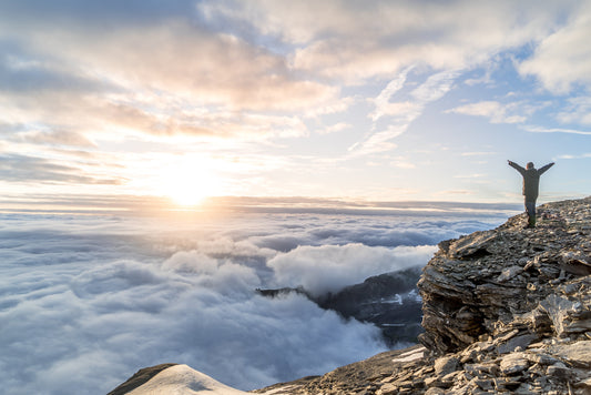 Backpacker in mountain setting because of endurance nutrition