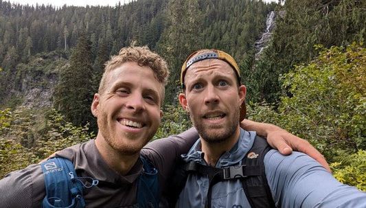 Two ultrarunners looking into the camera after realizing their trail running nutrition strategy is off