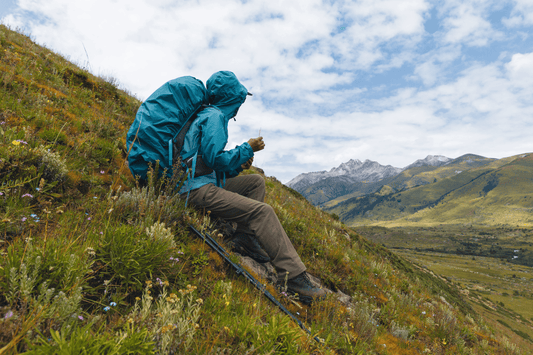 Backpacker taking a break.  Does sugar prevent bonking? Backpacking Meals Sugar Content in Recpak
